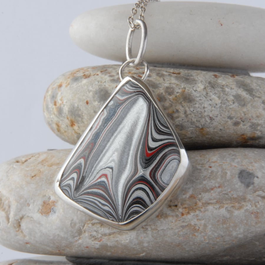 SALE - Sparkly fordite and sterling silver pendant