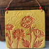 Retro style ceramic tile decoration in red and yellow
