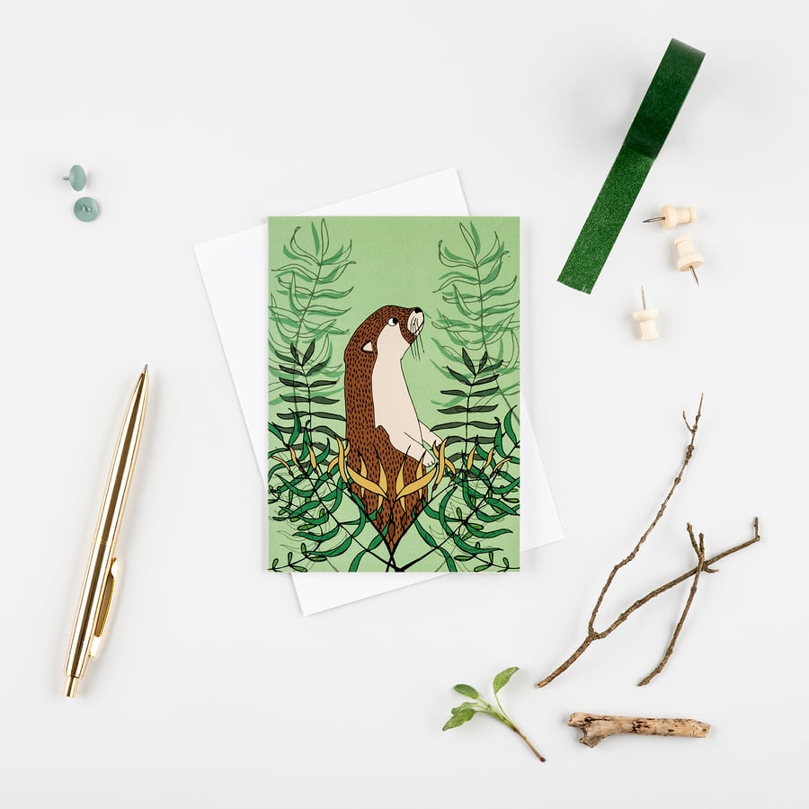 Otter and kelp greetings card