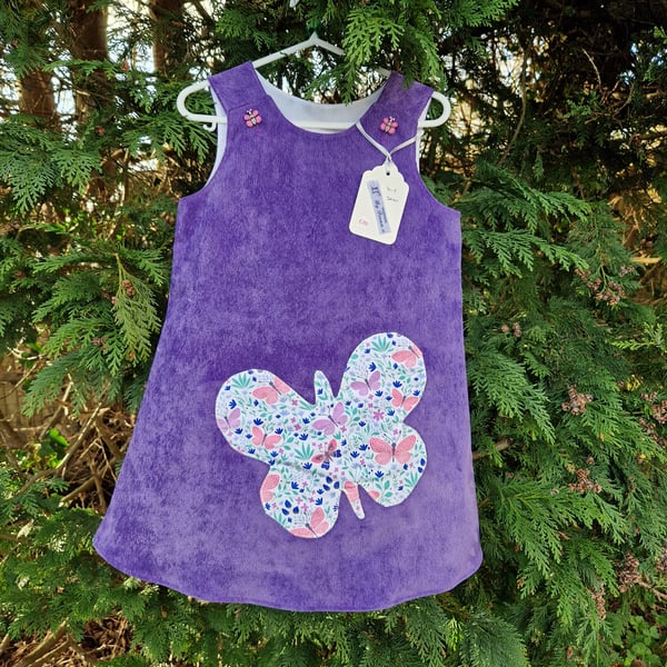 Age: 4-5yr Purple Butterfly Needlecord dress. 