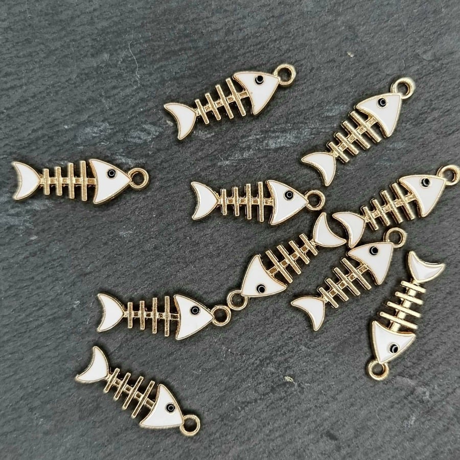 10 white and gold enamel fish charms 
