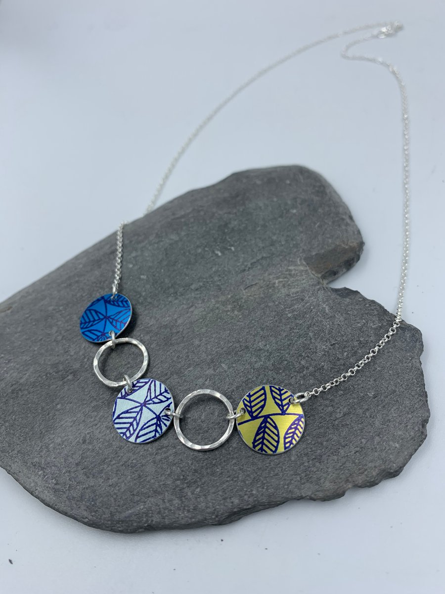 Blue and lime green leaf circle and recycled silver ring necklace