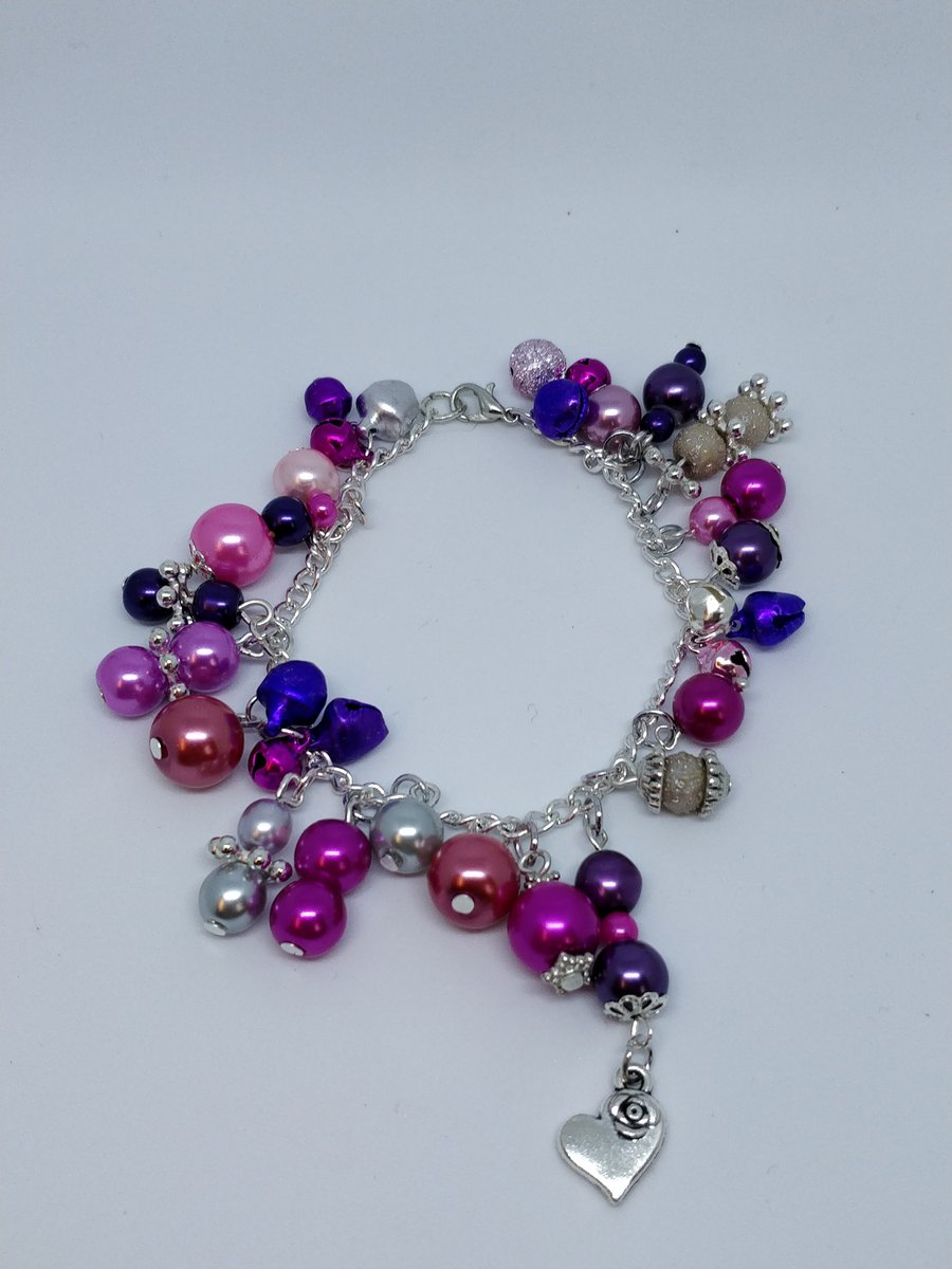 Child's pink and purple beaded bracelet