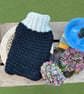 Hand knitted merino wool hot water bottle 