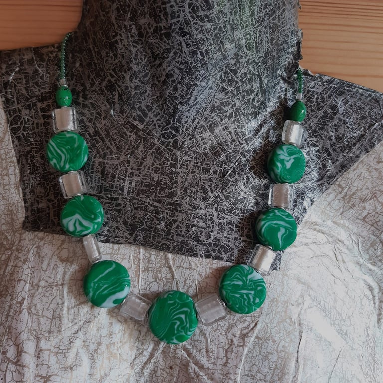 Handmade green and white polymer clay and glass necklace