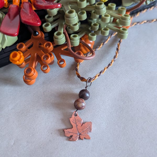 Copper leaf pendant with picasso jasper beads and plaited macrame necklace