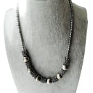 Gunmetal necklace in silvery grey with a toggle clasp