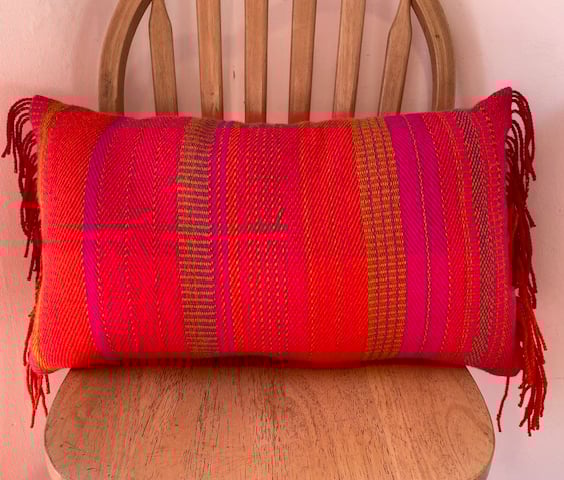   Rectangular shaped cushion with fringing detai, hand crafted from British wool