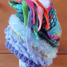 "Carnival" hand knitted trailing hat