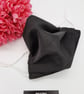 Face mask, medium,  3 layer, nose wire,  adjustable, washable in black.   - Image 1
