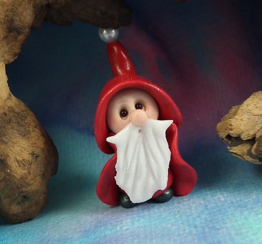 Gnome 'Nicholas' hiding in plain sight Undercover Santa by Ann Galvin