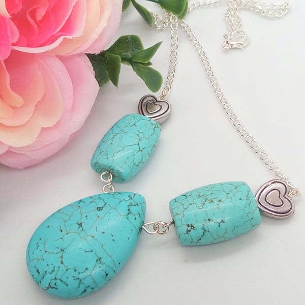 Turquoise Beads and Silver Plated Hearts Pendant on a Silver Chain Necklace