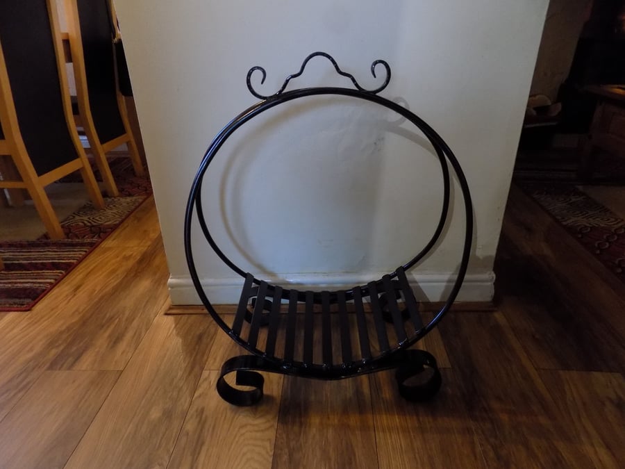HAND CRAFTED LOG HOLDER............................Wrought Iron (Forged Steel)
