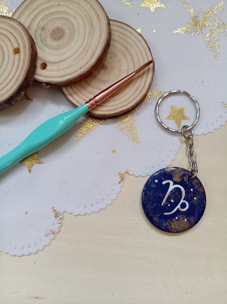 Wooden circular starsign capricorn keyring 