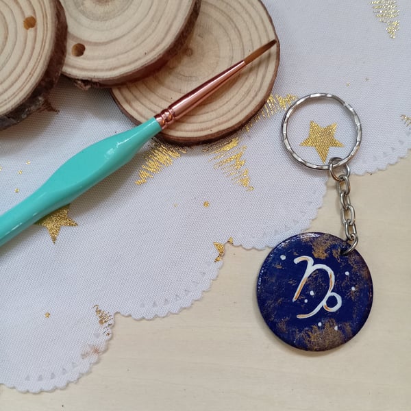 Wooden circular starsign capricorn keyring 
