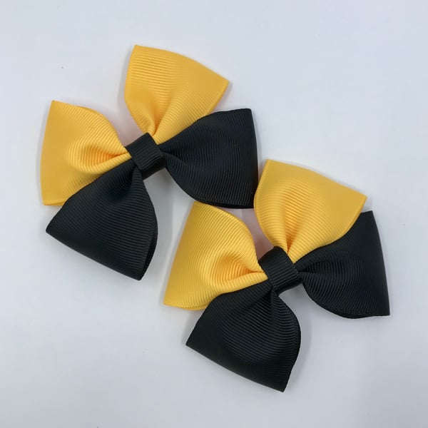 Black and Yellow Gold Two Tone Double with Bows on Clips (pair)