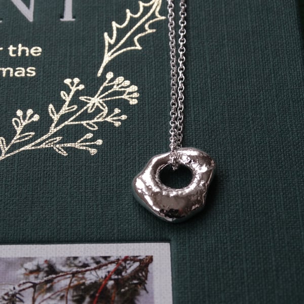 Silver hag stone pendant - molten silver nugget - silver charm amulet OOAK