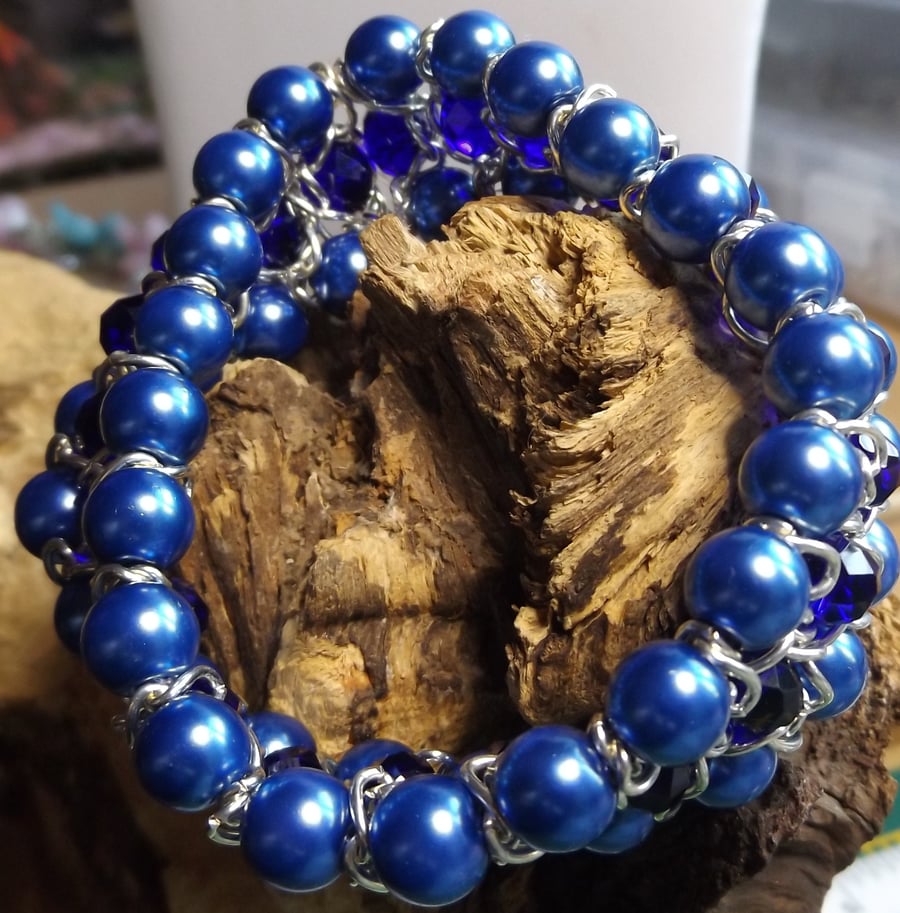 Glass pearl with silver plated chain and blue crystal stretch bracelet cuff