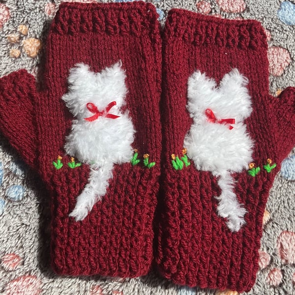 Soft pretty.  mittens with a fluffy white cat  on