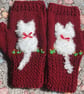 Soft pretty.  mittens with a fluffy white cat  on