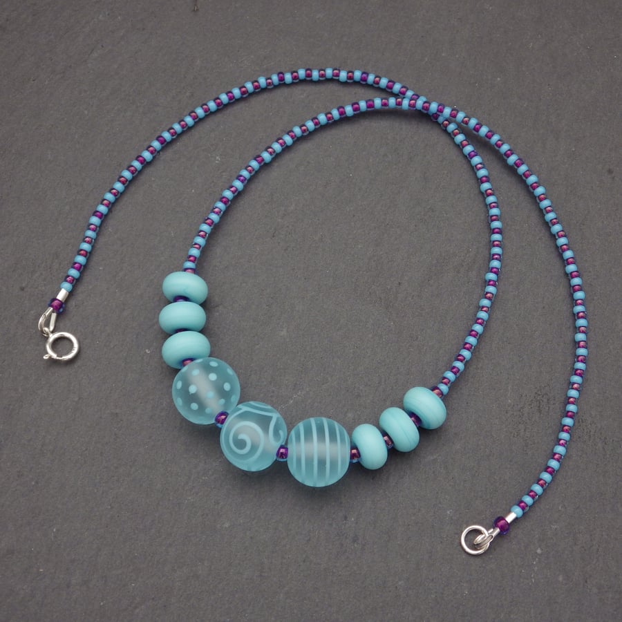 Baby blue lampwork glass bead necklace