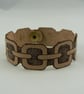 Pyrographed leather bracelet featuring chain design - Image 2