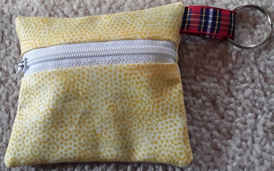 Yellow spotted coin purse