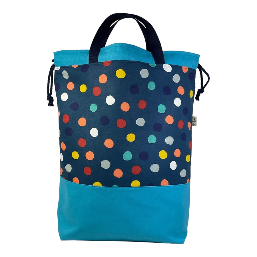 XXL drawstring knitting bag with denim blue Multicoloured spot print