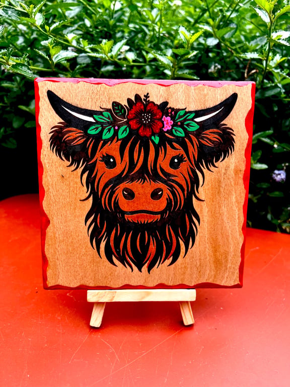 Baby highland cow. Wooden plaque. 