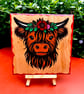 Baby highland cow. Wooden plaque. 