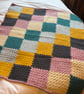 Crocheted patchwork baby blanket