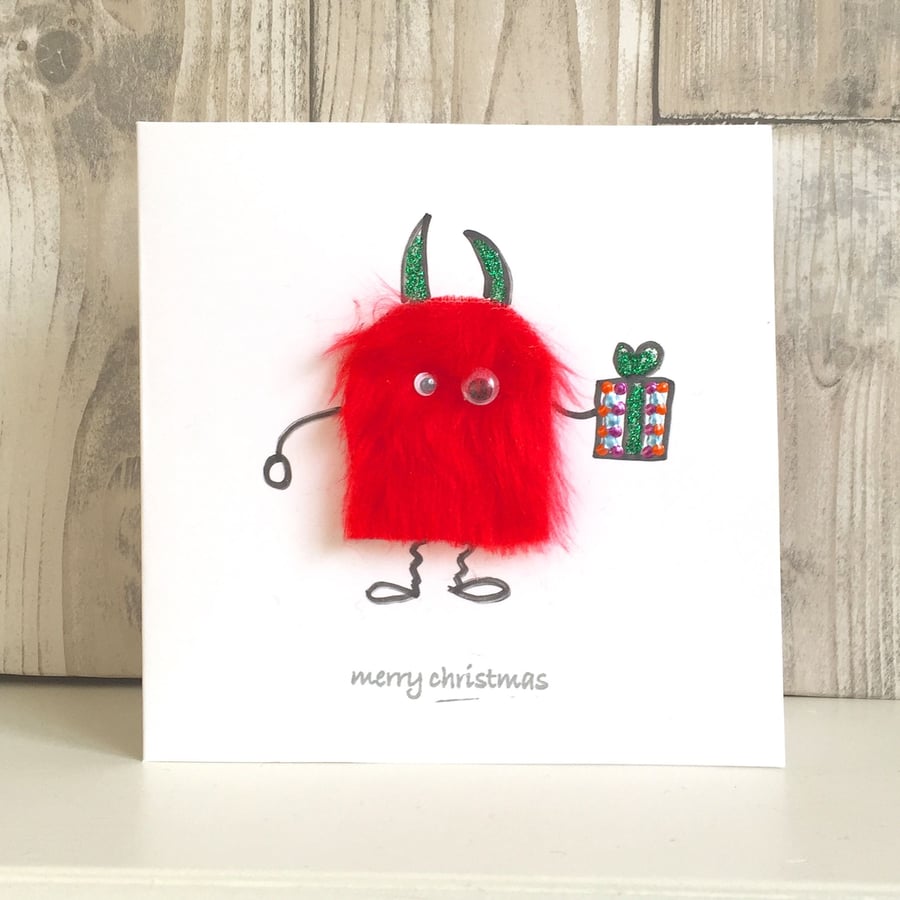 Christmas card - fun mini monster with Christmas gift Christmas present