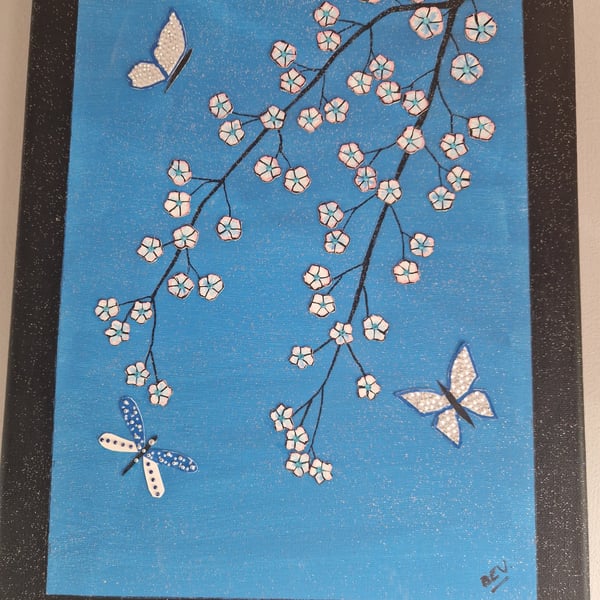 Blossoms and butterflies collage on canvas. 