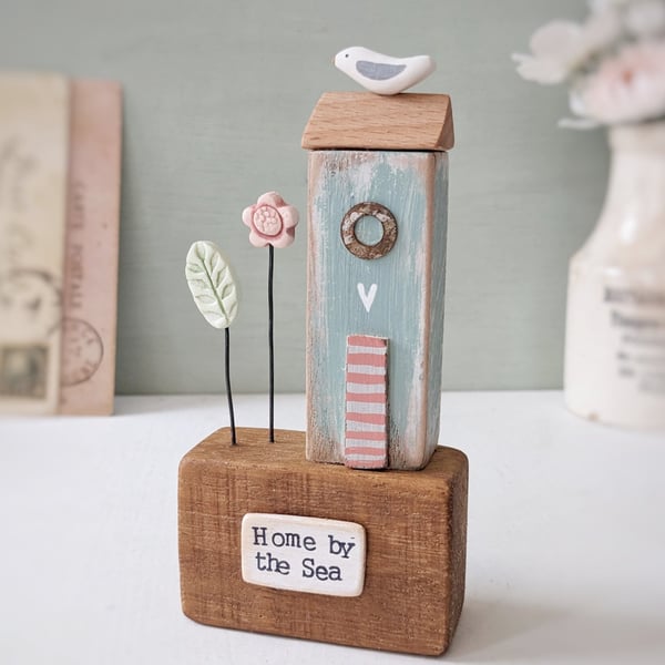 Tall Wooden Sea Hut with Clay Flower and Seagull 'Home by the Sea'
