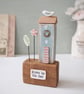 Tall Wooden Sea Hut with Clay Flower and Seagull 'Home by the Sea'