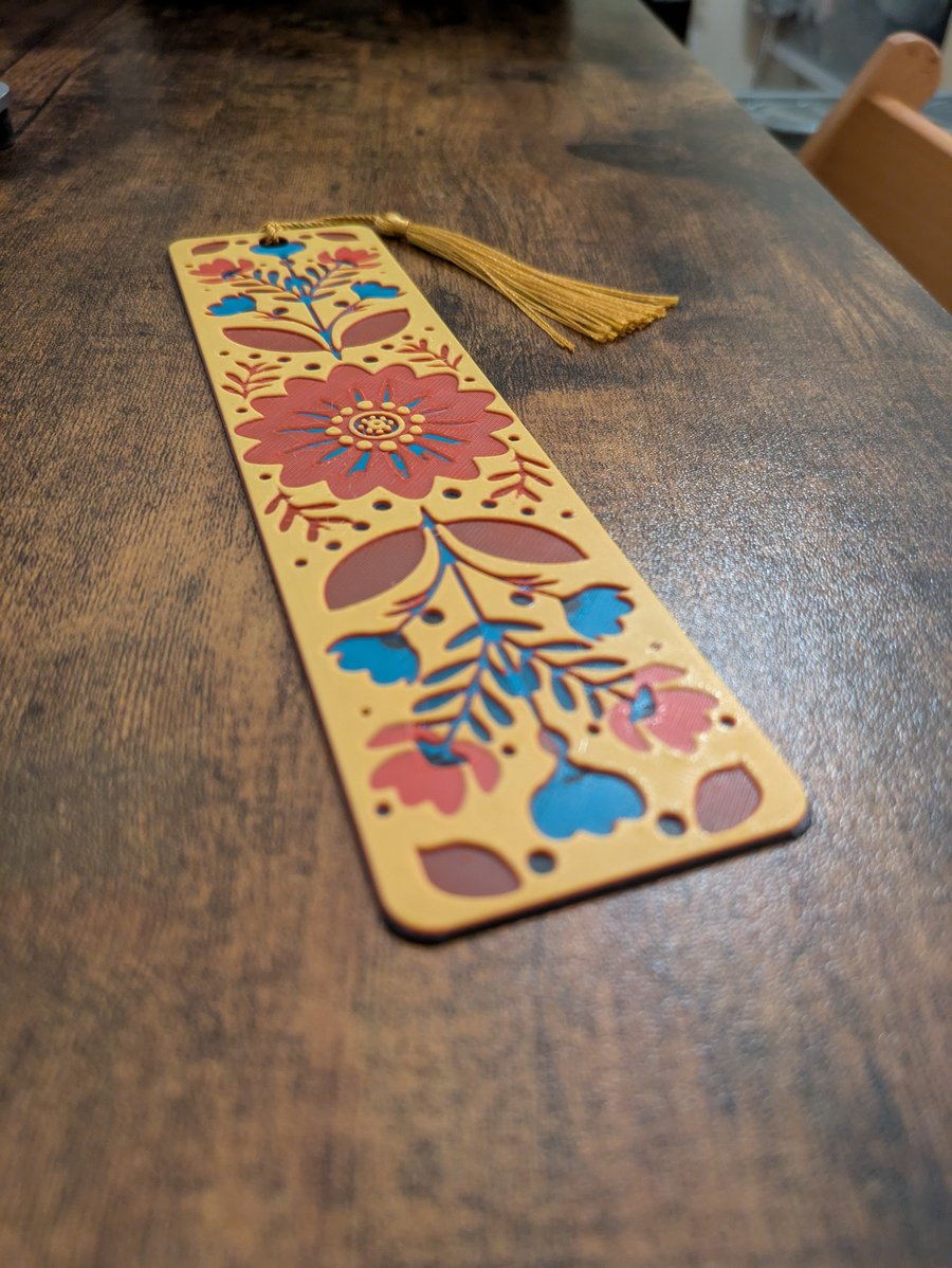 Folk floral bookmark with 3D effect books