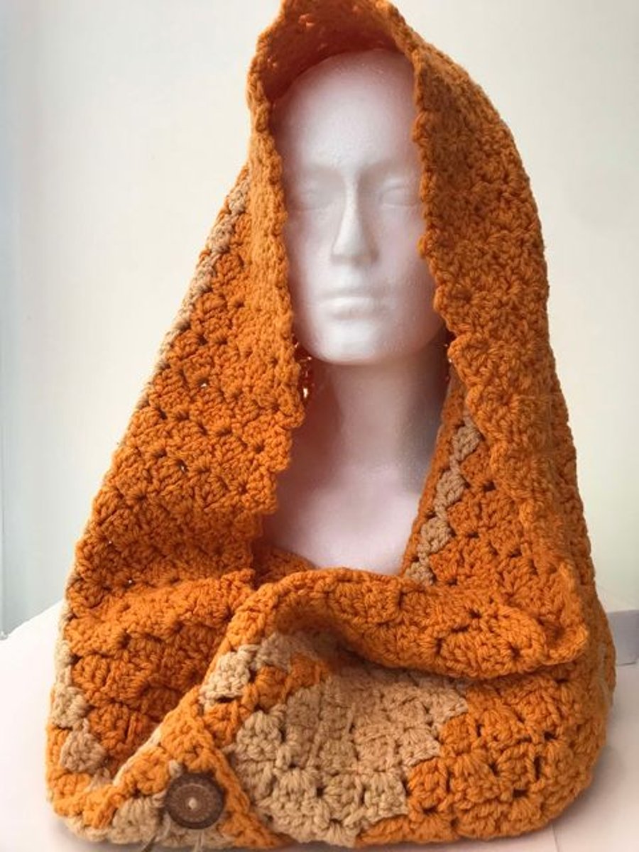Crocheted hooded scarf orange-latte 4 buttons