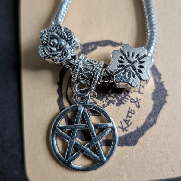 Charm bracelet with sun and moon