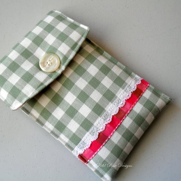  Kindle case in a green and cream check. 