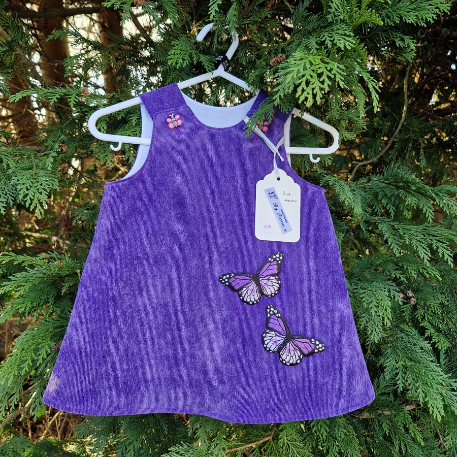 Age: 3-6m Purple Butterfly Needlecord dress. 