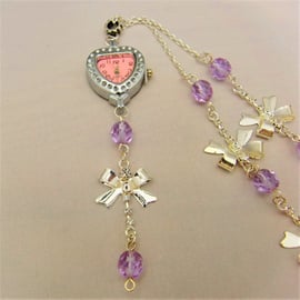 Heart Shaped Fob Watch on a Long Line Chain with Silver Bows and Lilac Crystals