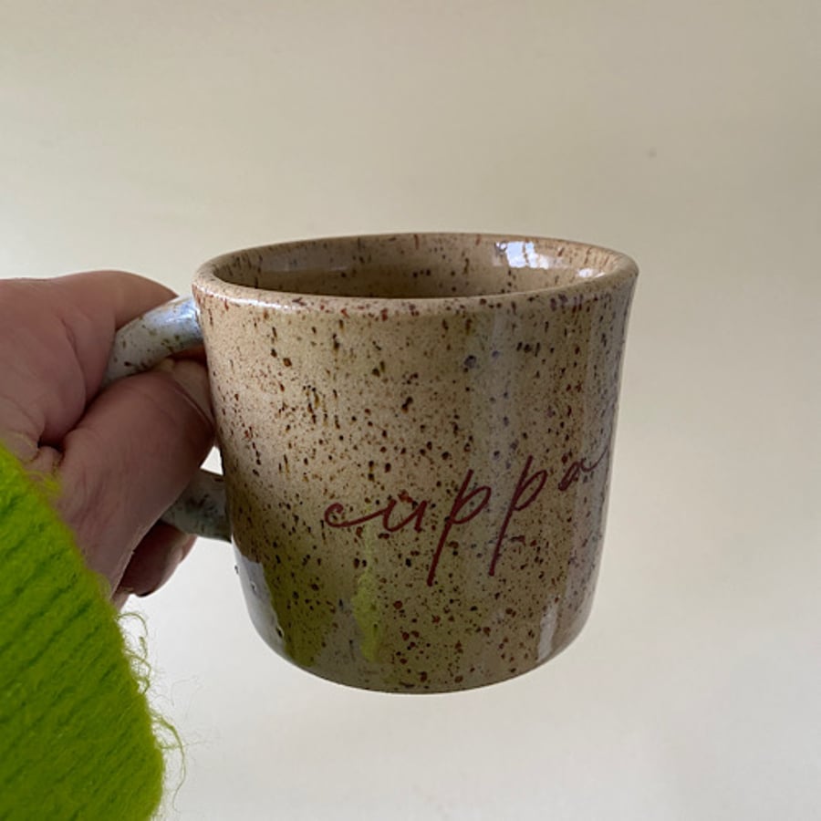 Speckled clay cuppa cup.