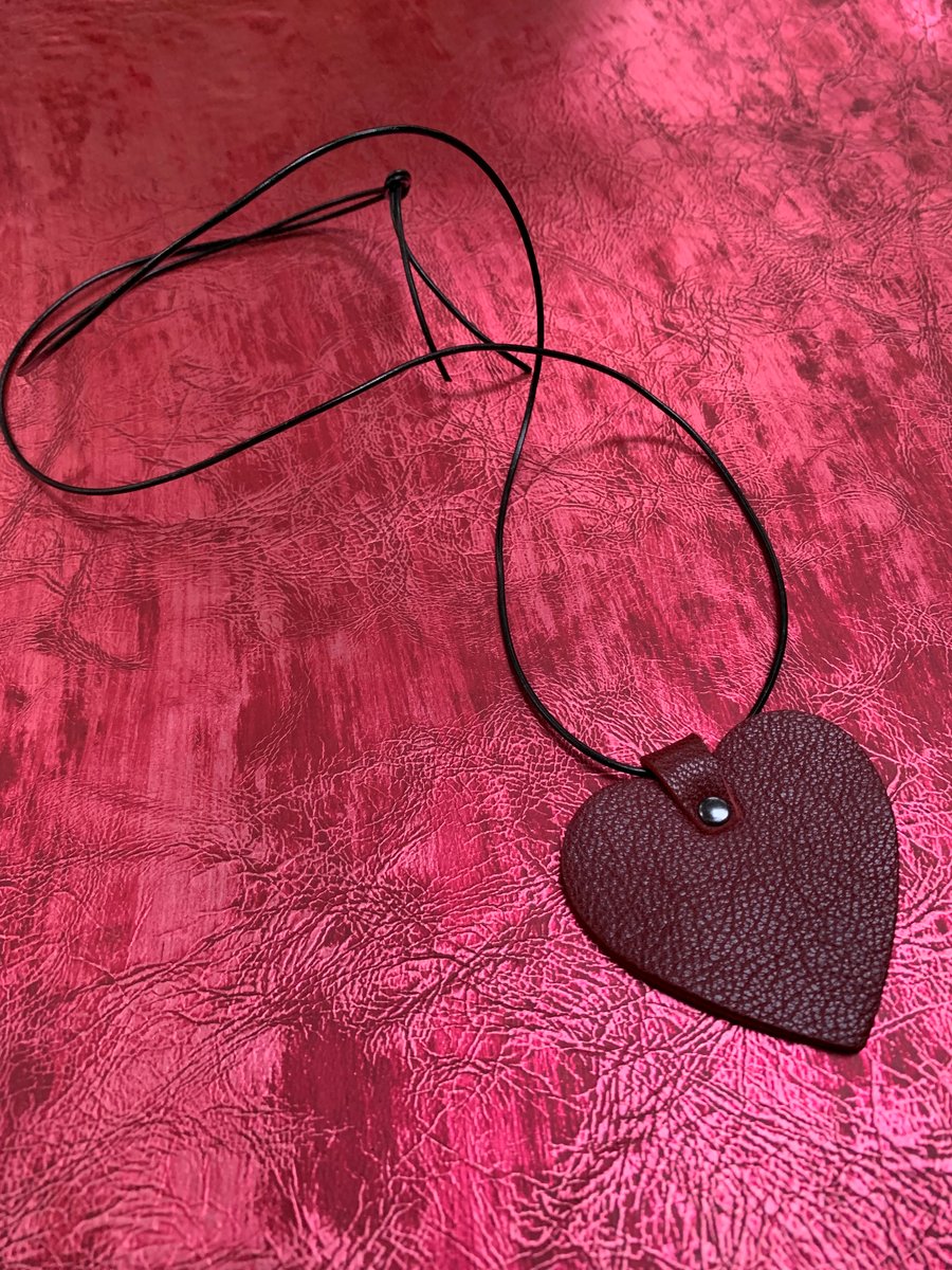 Red leather heart pendant with long leather thong