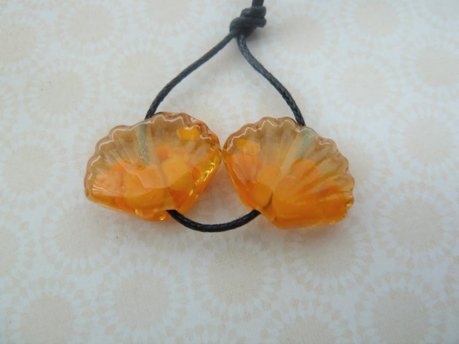 yellow shell lampwork glass bead pair