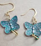18k gold plated earrings with copper butterfly charms oxidised turquoise