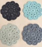 Set of 4 crochet coasters in blues - Image 1