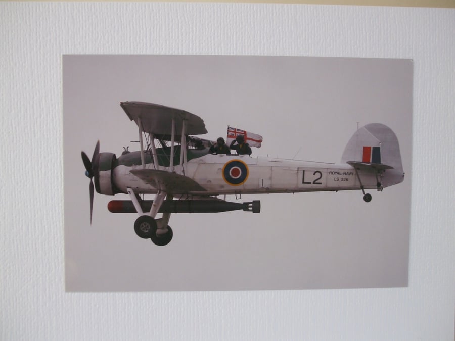 Photo of a Fairy Swordfish aircraft, taking the salute.