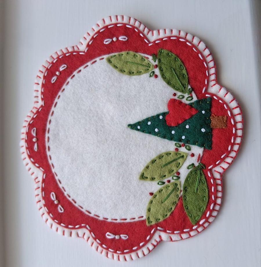Handmade felt candle mat