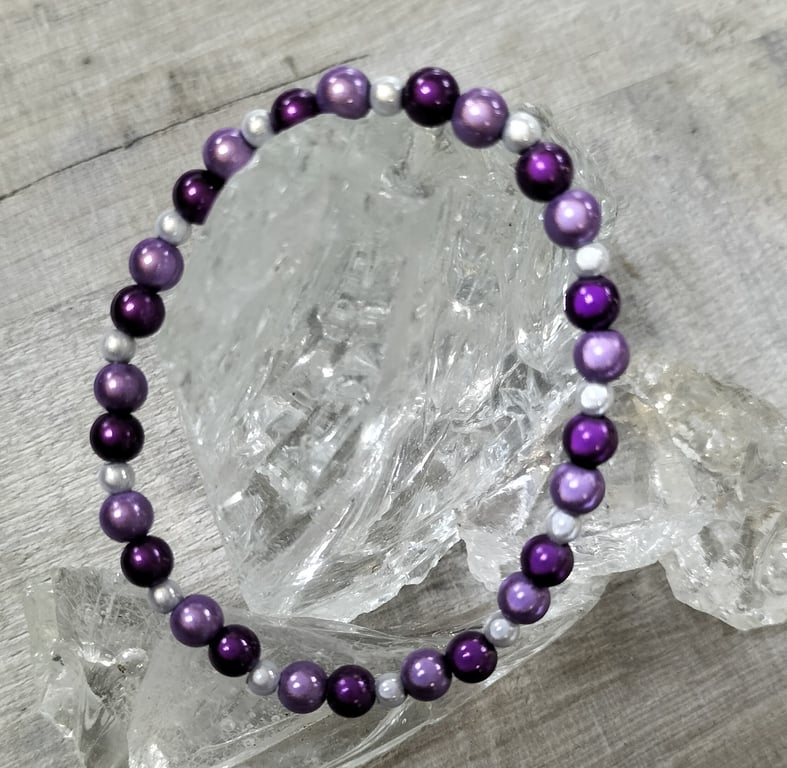 BR483 Purple and silver miracle bead elasticated bracelet 