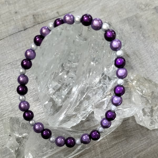 BR483 Purple and silver miracle bead elasticated bracelet 